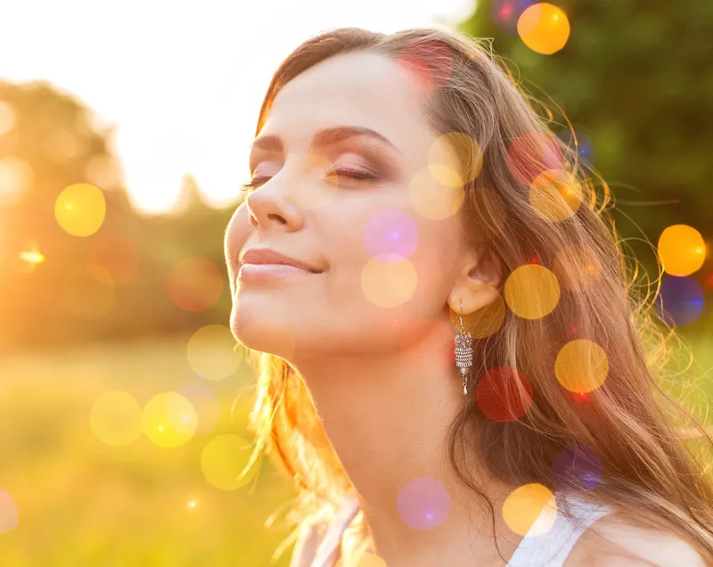 Someone in nature smiles